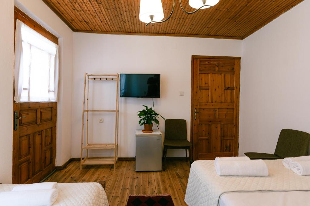 Postel nebo postele na pokoji v ubytování Petrichor
