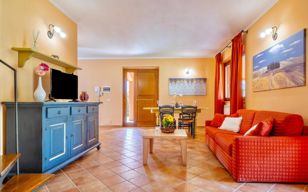 TV a/nebo společenská místnost v ubytování Residence with swimming-pool and thermal pools in Sorano