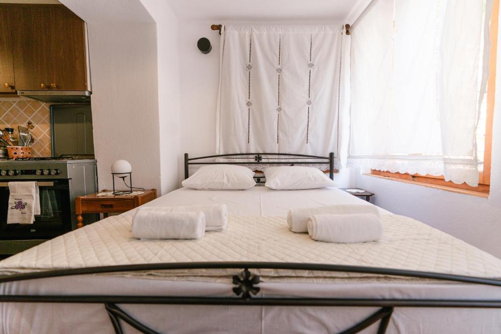 Postel nebo postele na pokoji v ubytování Petrichor