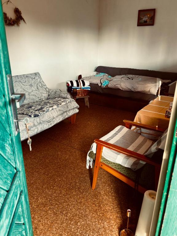 Postel nebo postele na pokoji v ubytování Chatička Lištička