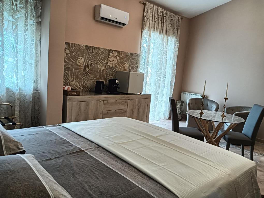 Postel nebo postele na pokoji v ubytování Dojo idro rooms