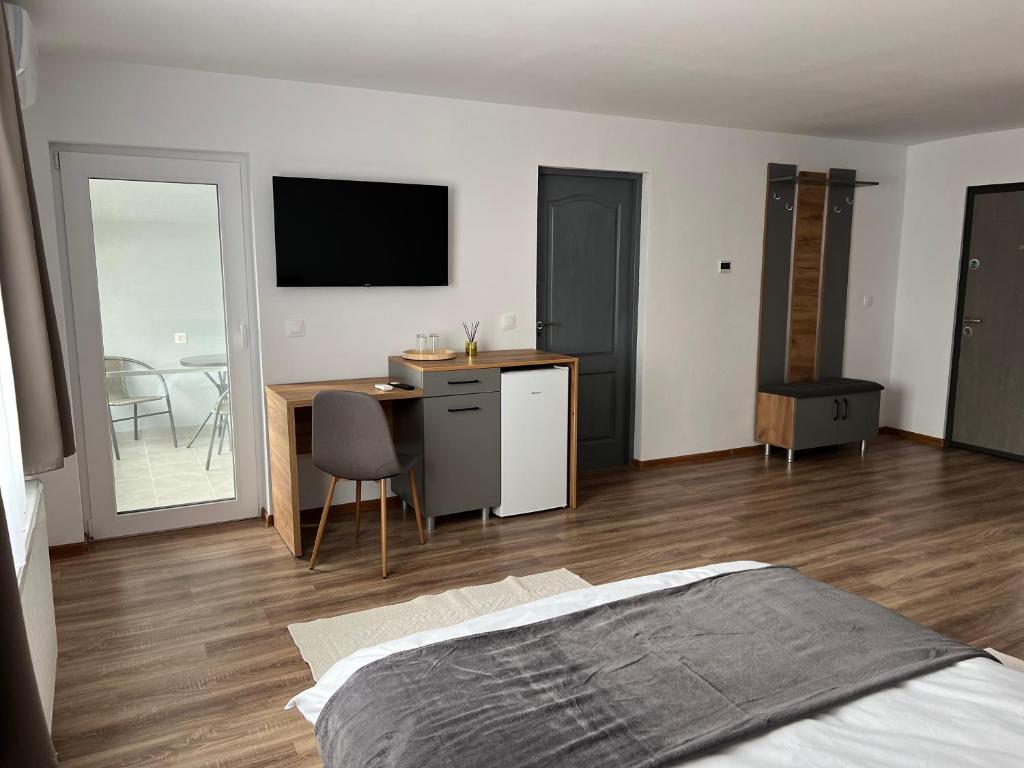 TV a/nebo společenská místnost v ubytování Salin Home