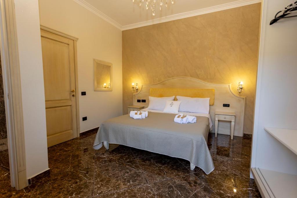 Postel nebo postele na pokoji v ubytování Hotel Terrazzo Sul Mare