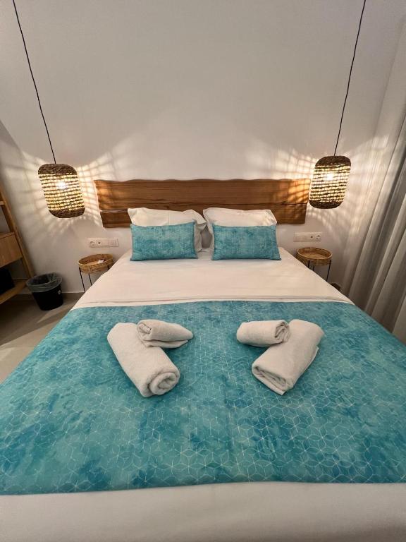Postel nebo postele na pokoji v ubytování Zoe Boutique Hotel