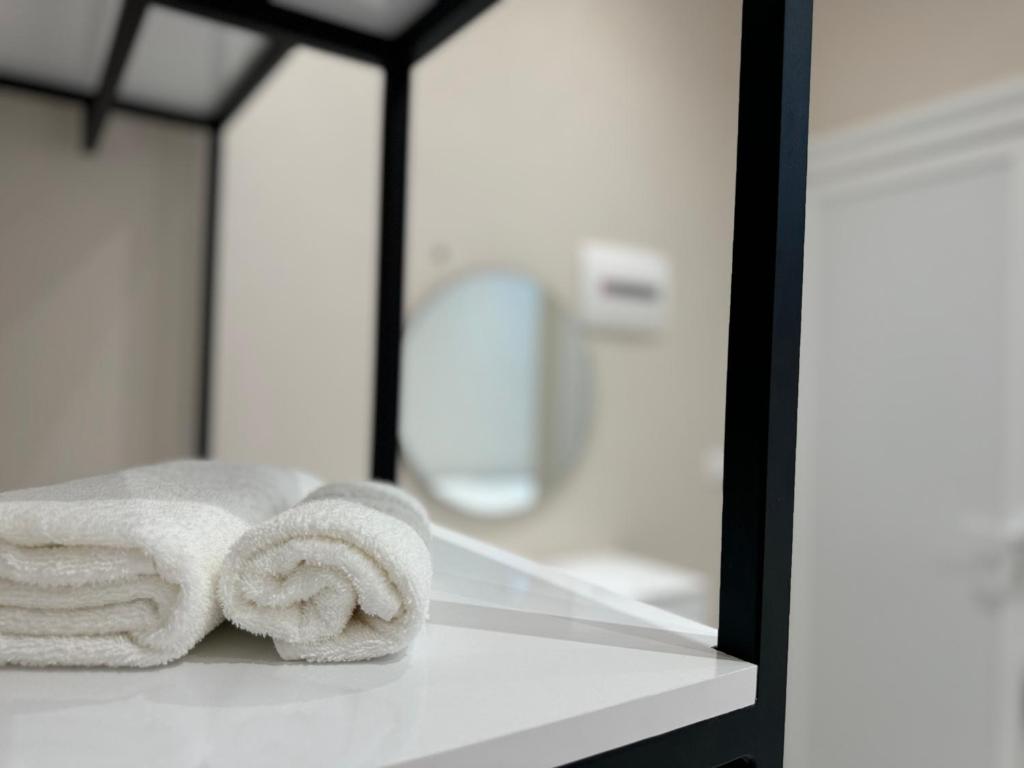 Koupelna v ubytování Aloju Rooms