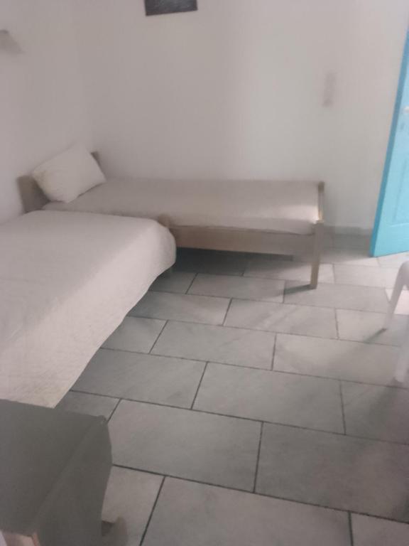 Postel nebo postele na pokoji v ubytování villa polemis