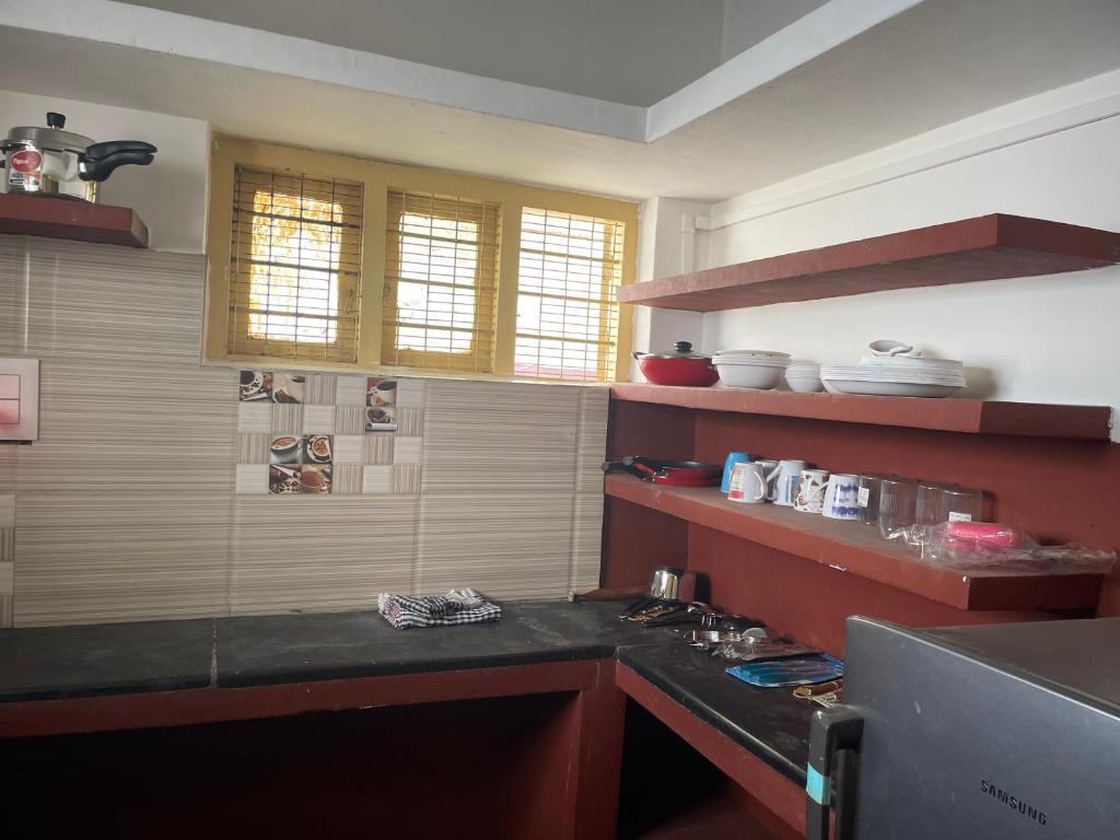 Kuchyň nebo kuchyňský kout v ubytování Neha's Homestay