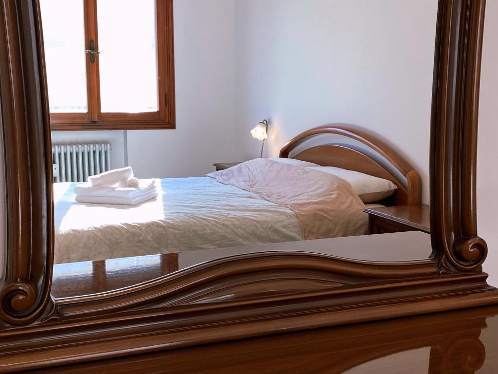 Postel nebo postele na pokoji v ubytování Venice Apollo