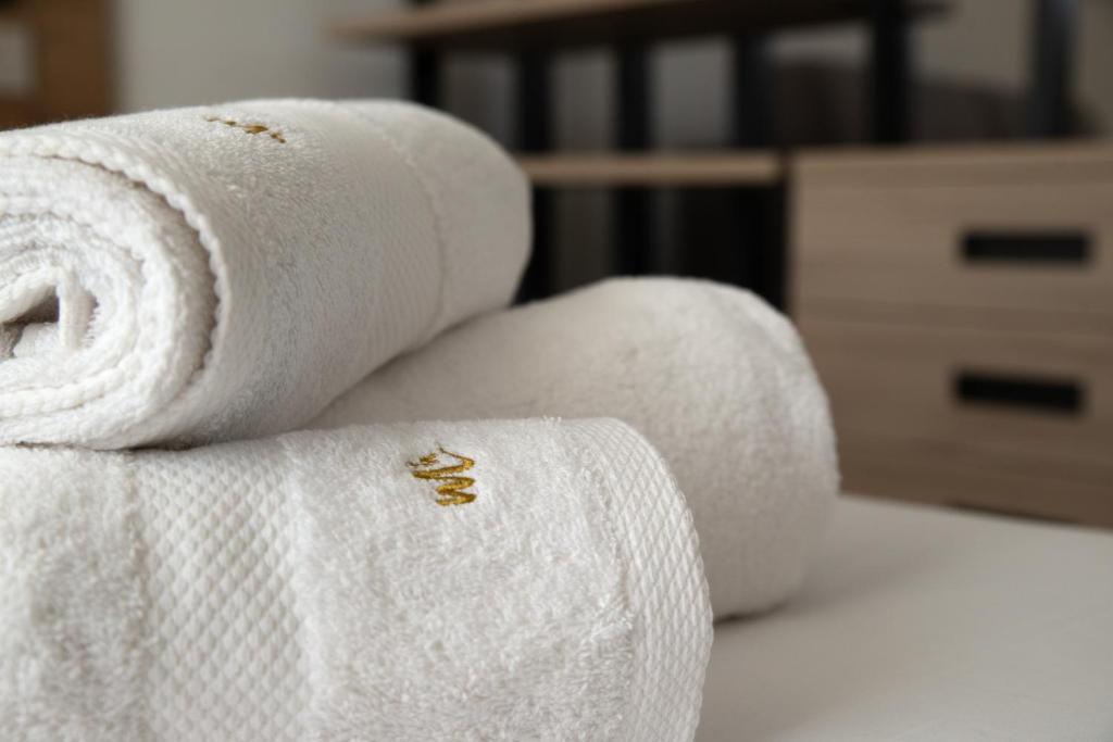 Postel nebo postele na pokoji v ubytování Montedarena Hotel