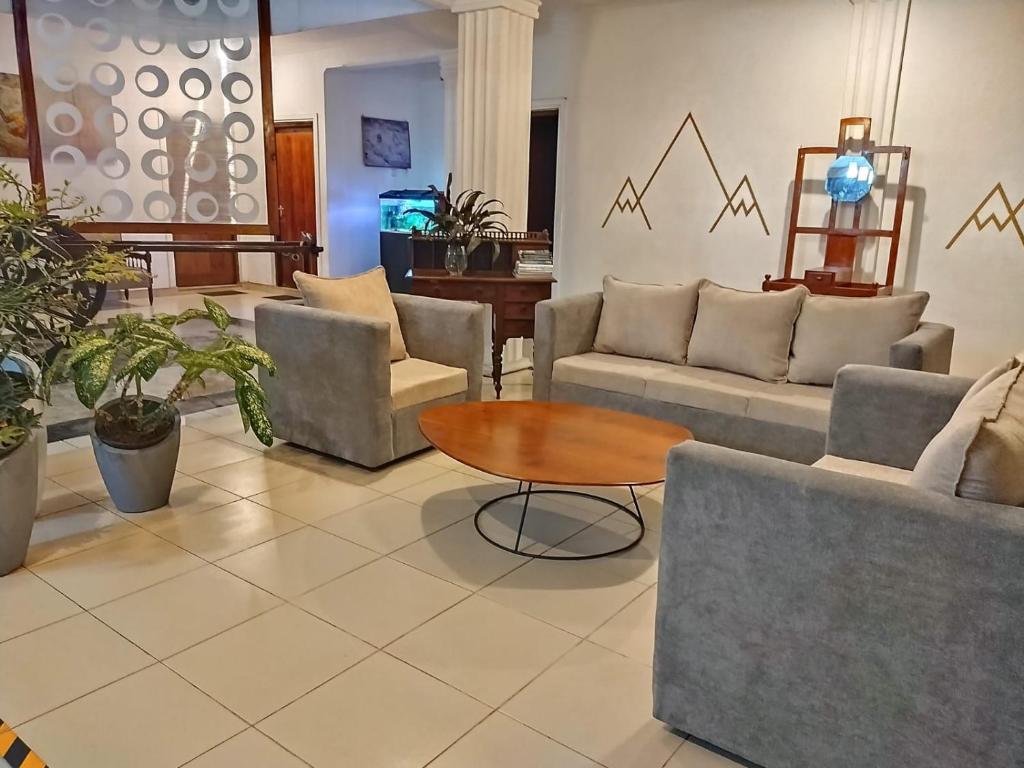 Posezení v ubytování Paradise Inn
