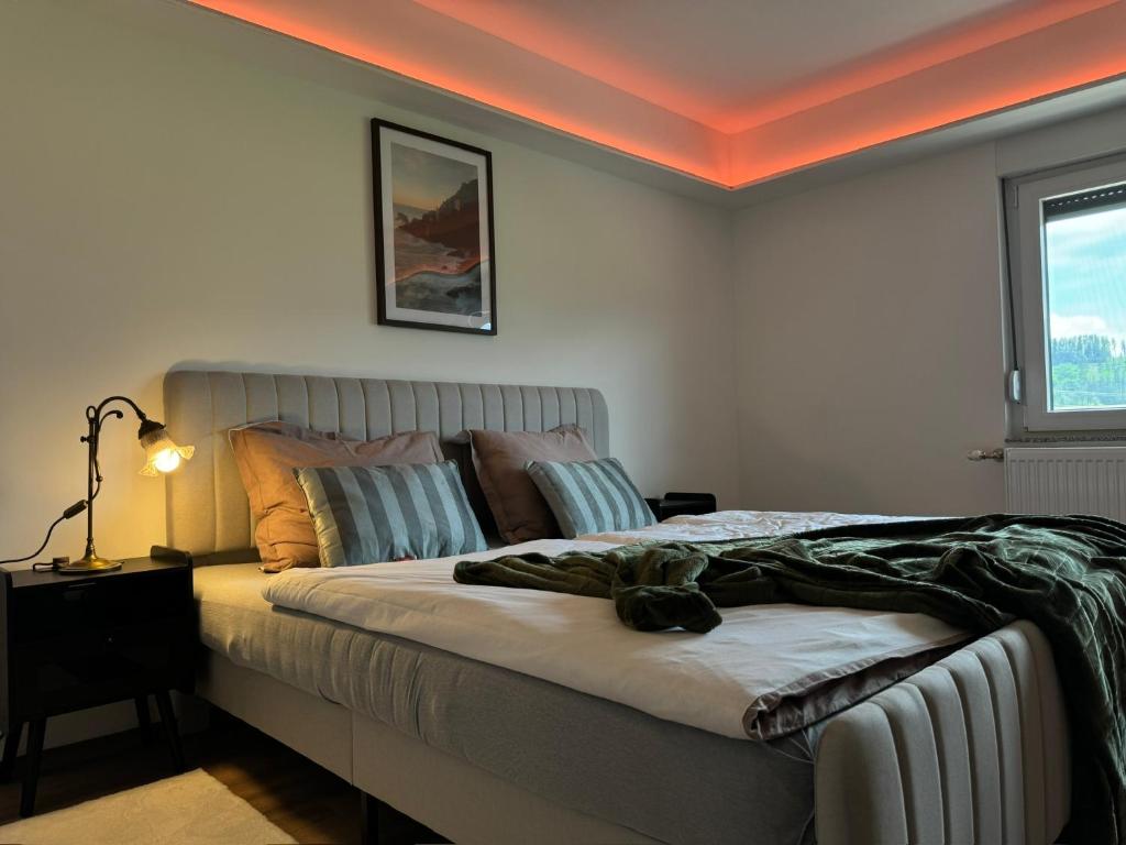 Postel nebo postele na pokoji v ubytování Ferienwohnung Conny