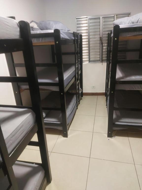 a group of bunk beds in a room at casa grande in Sao Paulo