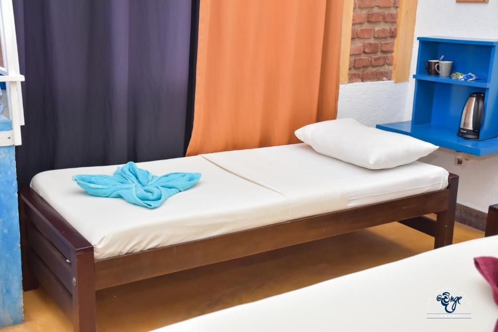 Postel nebo postele na pokoji v ubytování The Change Hotel
