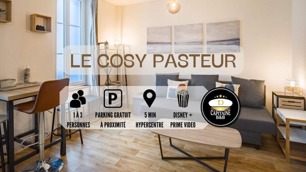 une chambre avec une table et un panneau sur le mur dans l'établissement Le Cosy Pasteur 5 min Hypercentre Parking public gratuit à proximité, à Troyes