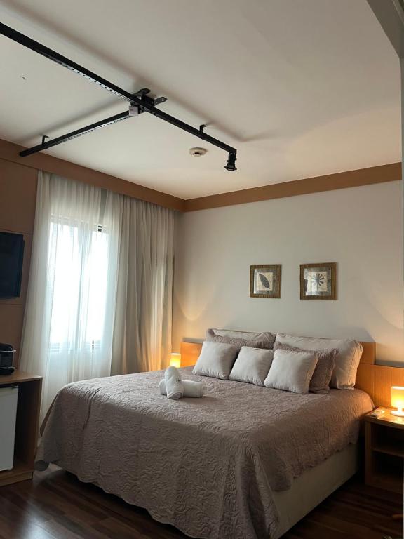 Кровать или кровати в номере Flat área nobre Tatuapé