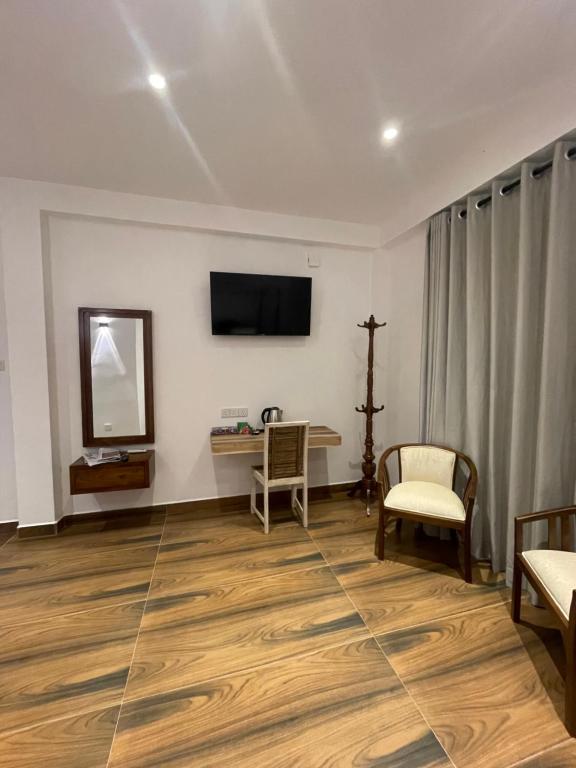 TV a/nebo společenská místnost v ubytování Citrine Kandy