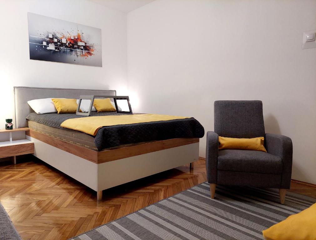 Postel nebo postele na pokoji v ubytování DiV Jagodina