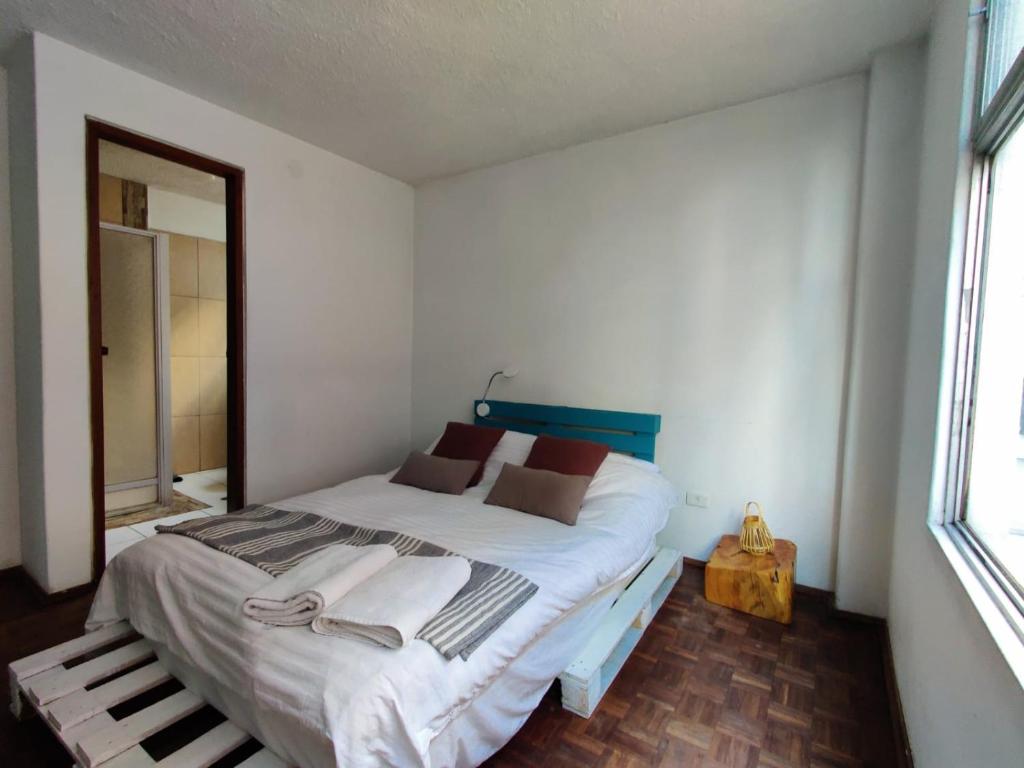 Postel nebo postele na pokoji v ubytování Edificio Foch
