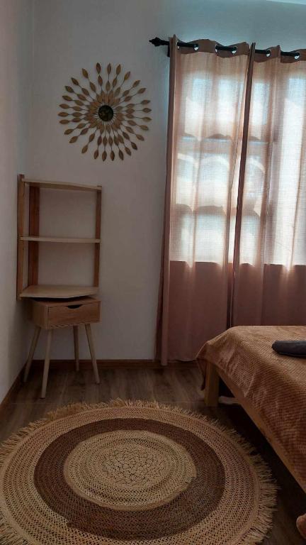 Postel nebo postele na pokoji v ubytování Location saisonnière Caza Villana