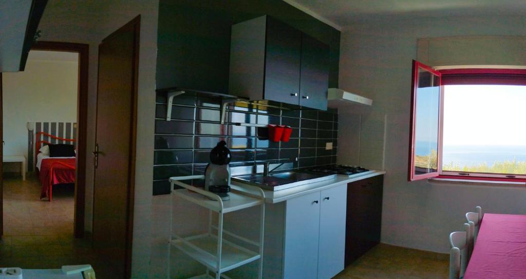 A kitchen or kitchenette at Residence San Antonio