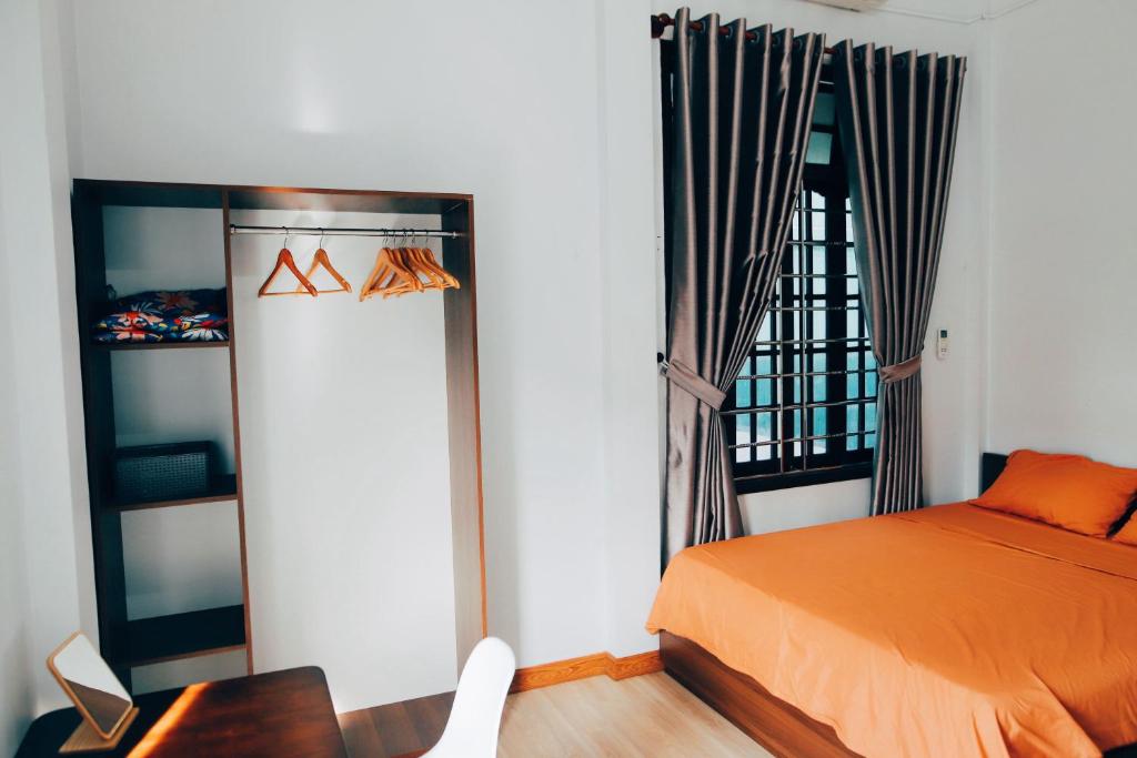 Postel nebo postele na pokoji v ubytování Susu Homestay Hue