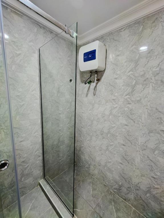 Koupelna v ubytování Lekki Continental Apartment
