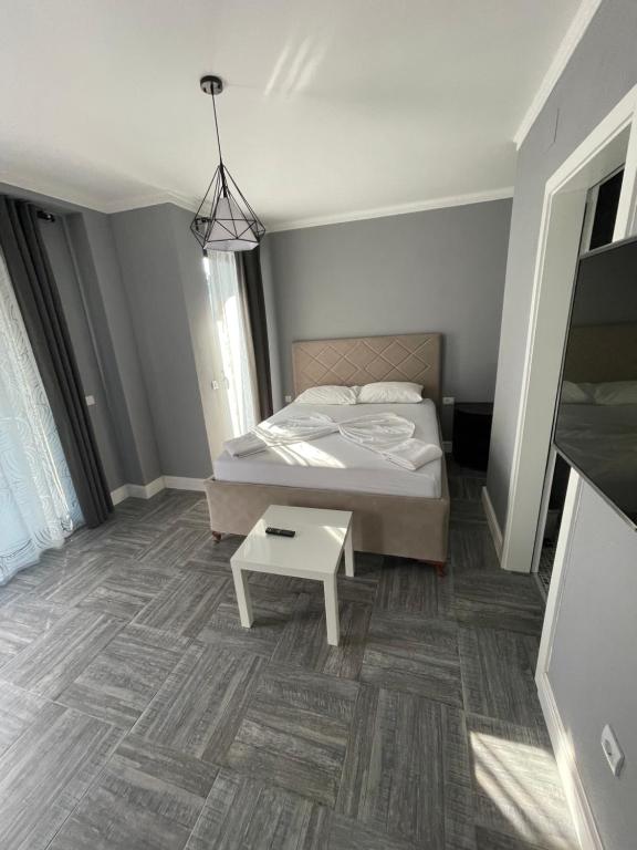 Postel nebo postele na pokoji v ubytování L&A Luxury Apartments