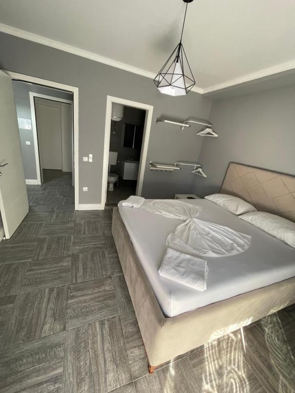 Postel nebo postele na pokoji v ubytování L&A Luxury Apartments