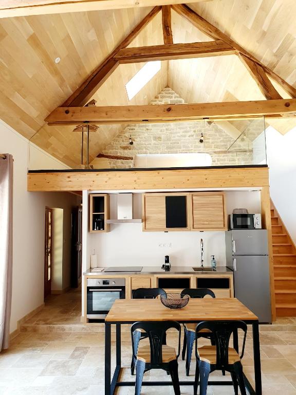 Kuchyň nebo kuchyňský kout v ubytování Gîte Le Pavillon Vougeot - Romanée - SPA