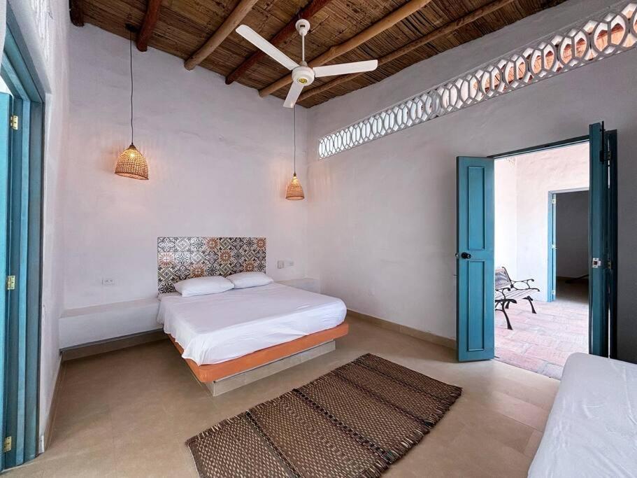 Postel nebo postele na pokoji v ubytování Casa Jardín de San Miguel