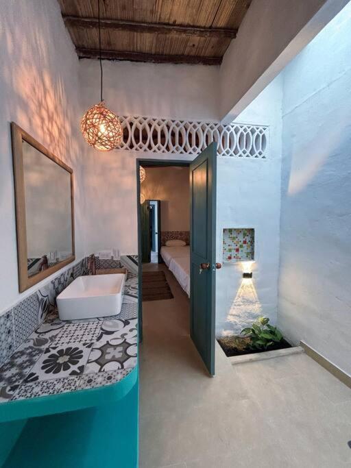 Postel nebo postele na pokoji v ubytování Casa Jardín de San Miguel