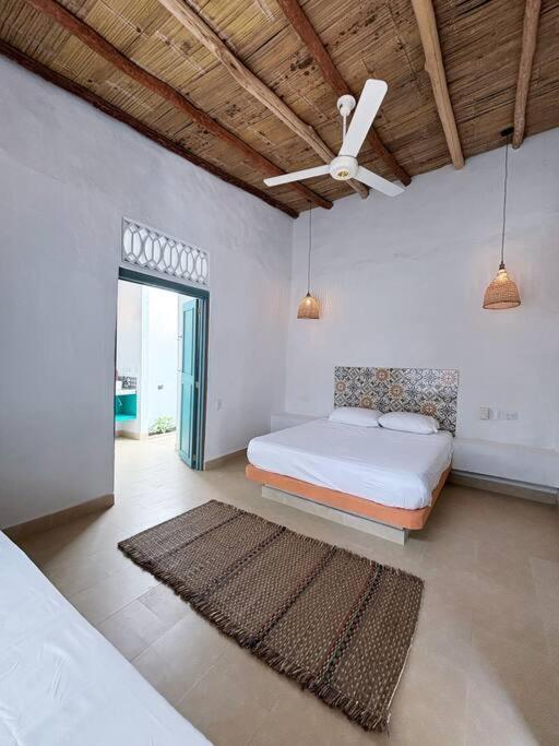 Postel nebo postele na pokoji v ubytování Casa Jardín de San Miguel