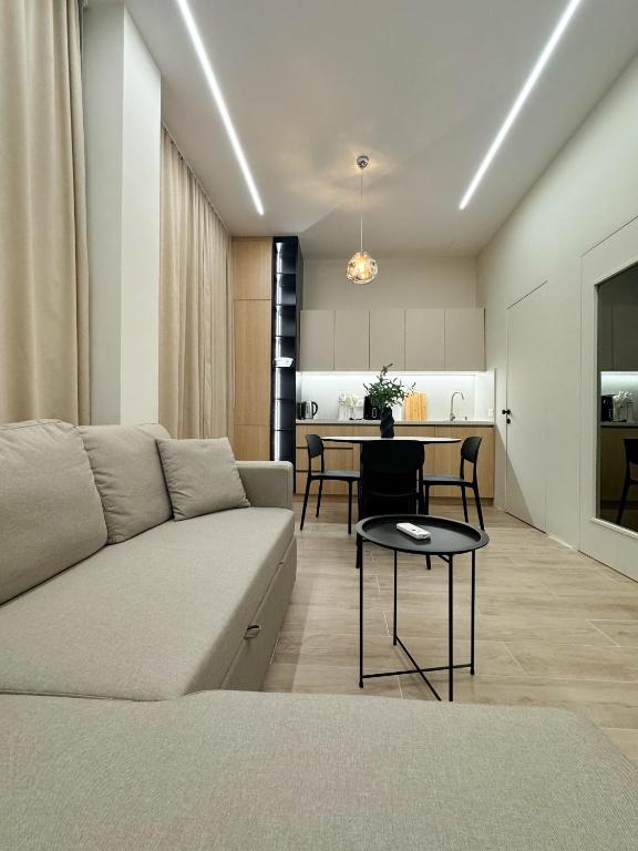 O zonă de relaxare la Nomad Stay Apartments