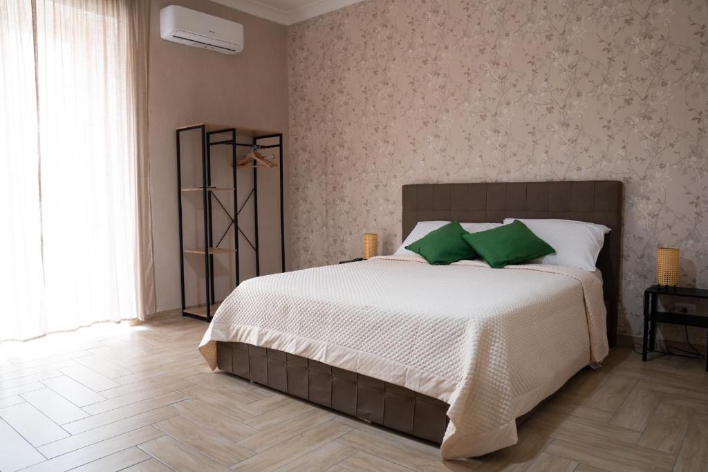 Posteľ alebo postele v izbe v ubytovaní B&B Caracciolo 109