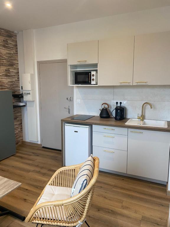 Kuchyň nebo kuchyňský kout v ubytování Appartement vue Port