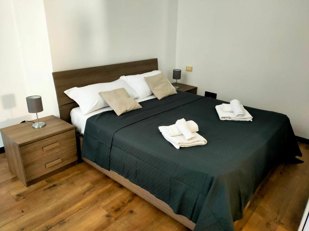 Postel nebo postele na pokoji v ubytování Rooms Ponte Calvi