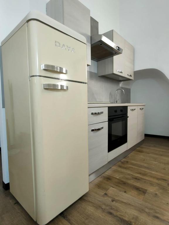 Kuchyň nebo kuchyňský kout v ubytování Rooms Ponte Calvi