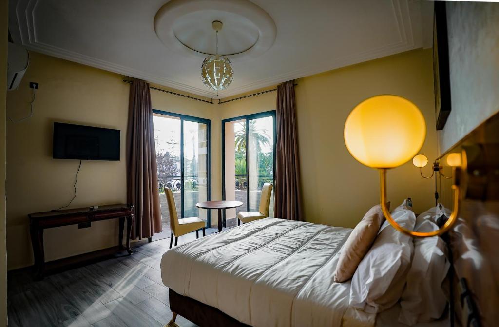 Postel nebo postele na pokoji v ubytování Hotel Arabesque