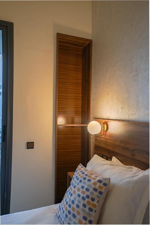 Postel nebo postele na pokoji v ubytování Hotel Arabesque