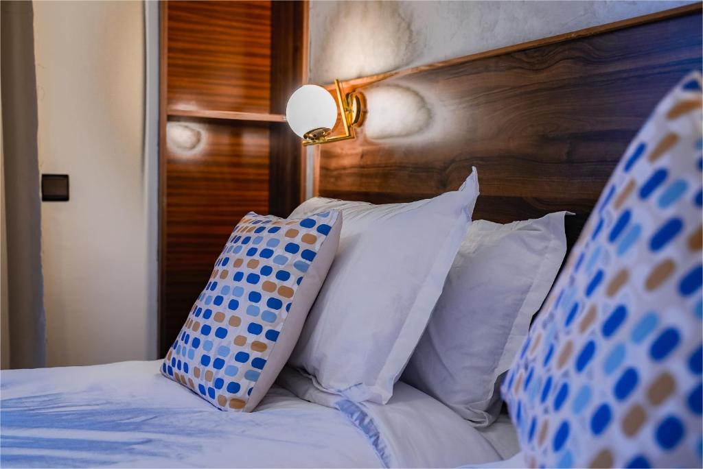 Postel nebo postele na pokoji v ubytování Hotel Arabesque