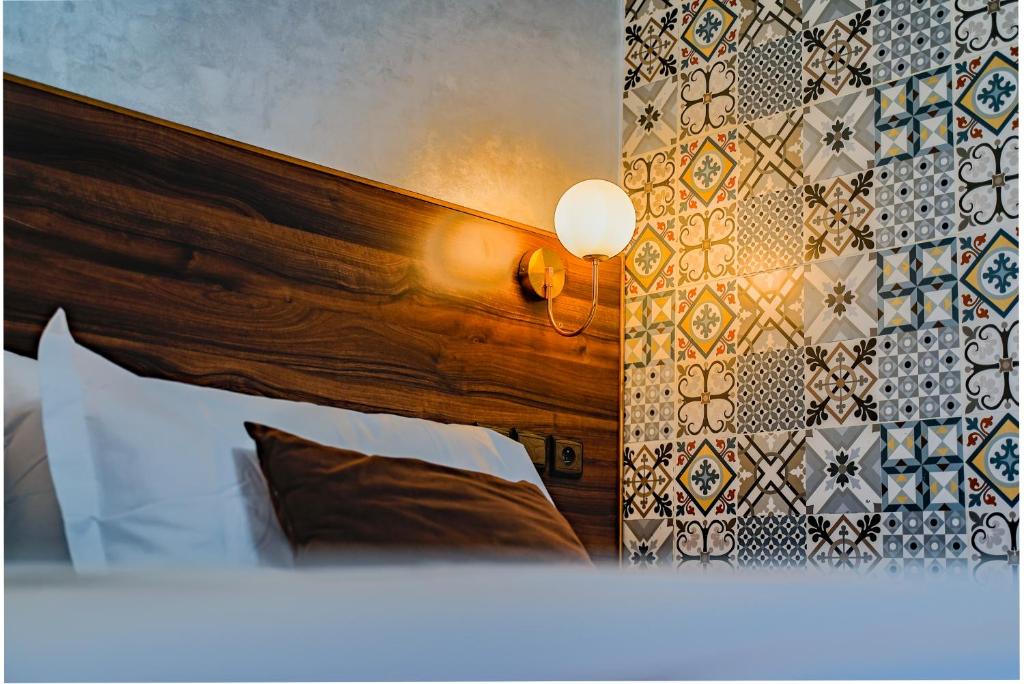 Postel nebo postele na pokoji v ubytování Hotel Arabesque