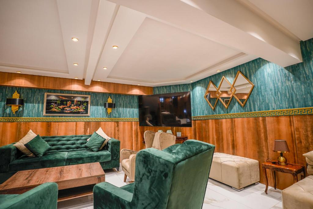 TV a/nebo společenská místnost v ubytování Hotel Arabesque