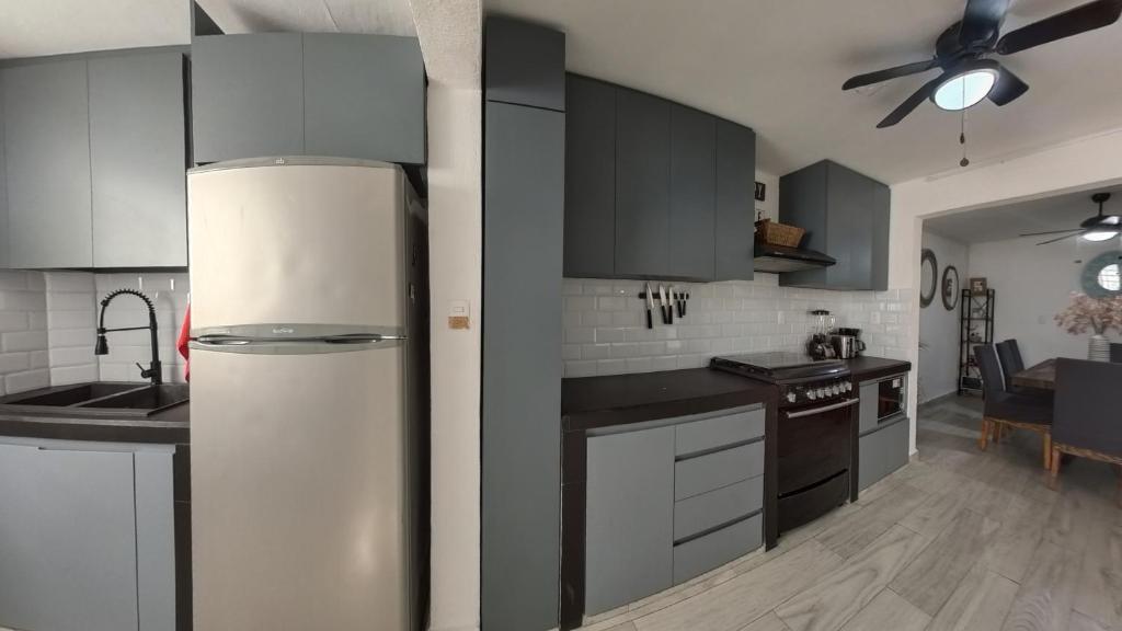 Kuchyň nebo kuchyňský kout v ubytování Casa Comfy