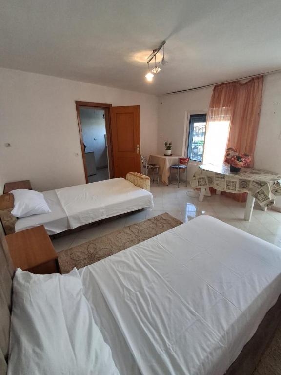 Postel nebo postele na pokoji v ubytování Aleko Guest House