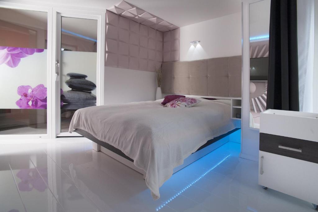Postel nebo postele na pokoji v ubytování Designpension Idyll Nr2 Hotel Garni