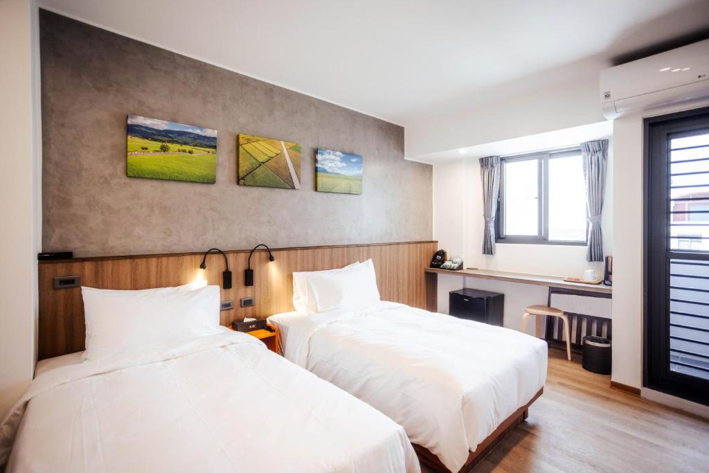 Postel nebo postele na pokoji v ubytování kaori B&B