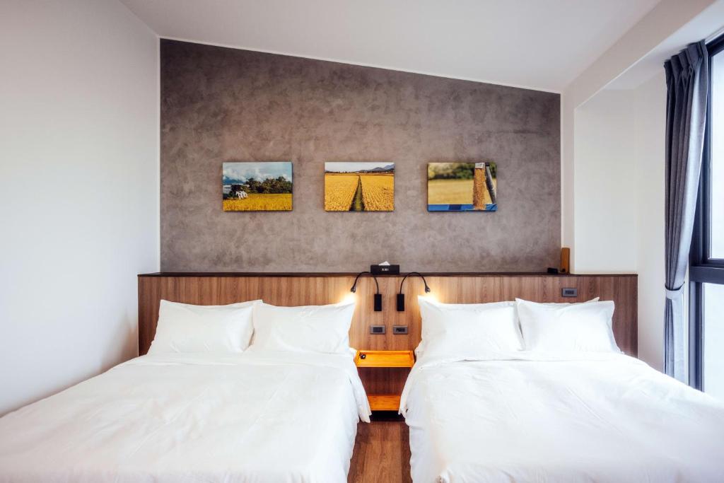 Postel nebo postele na pokoji v ubytování kaori B&B