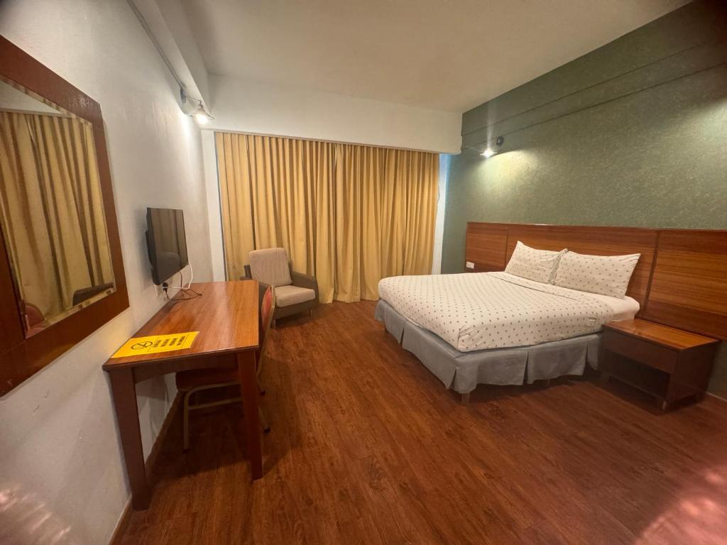 Postel nebo postele na pokoji v ubytování MAYRES HOTEL