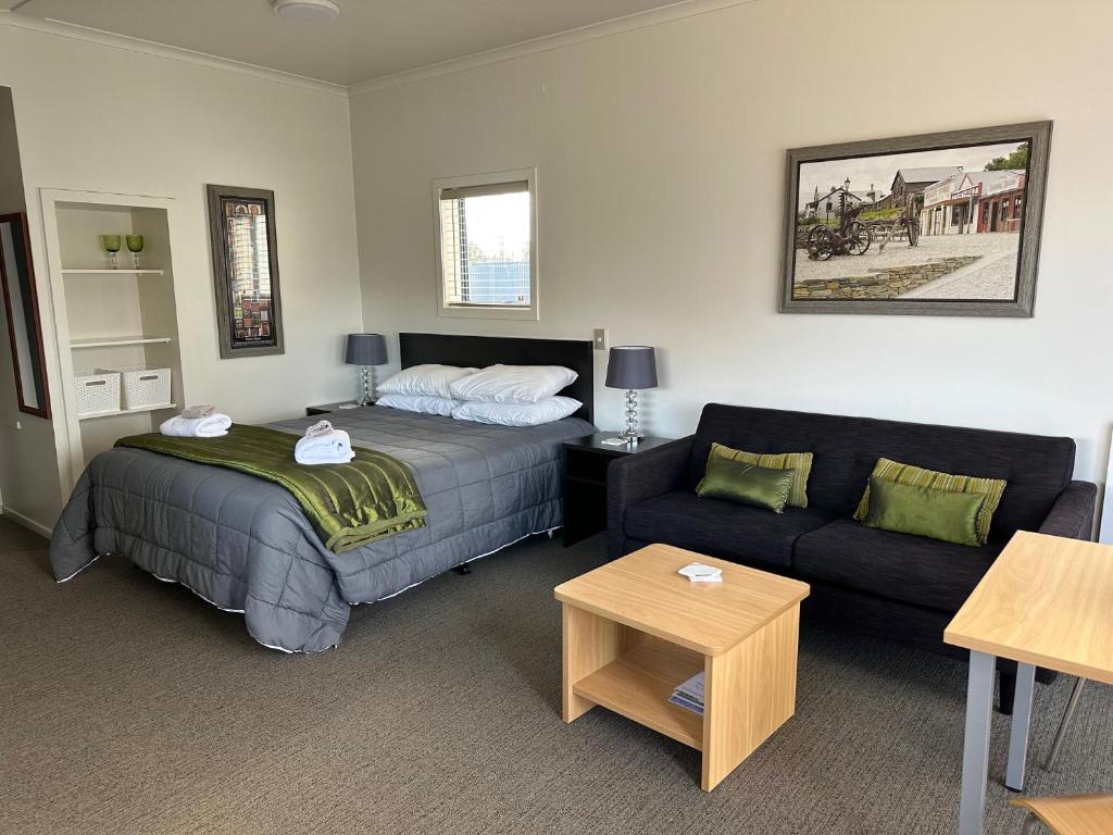 Postel nebo postele na pokoji v ubytování Anderson Park Motel