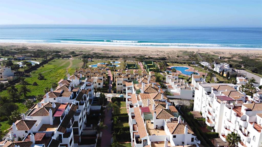 an aerial view of a resort with the ocean at Zahara almadraba playa Atlanterra in Zahara de los Atunes